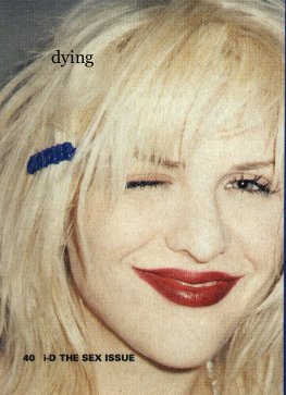Courtney Love in very 1990s makeup.