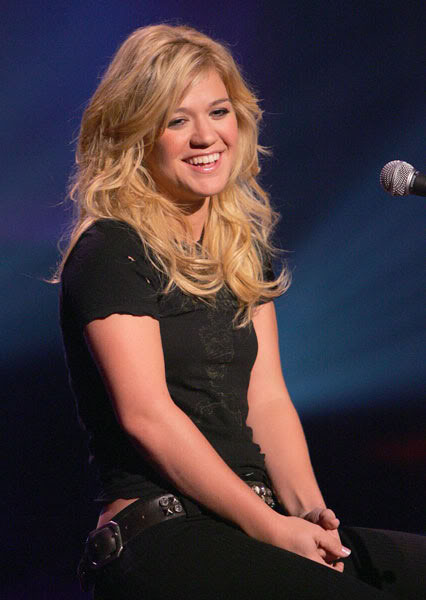 Kelly Clarkson with blonde hair.