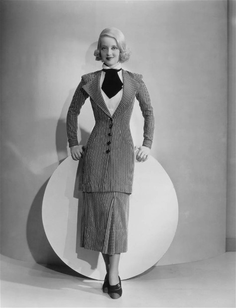 Bette Davis in checkered suit.