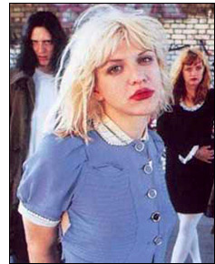 Courtney Love in a kinderwhore outfit.