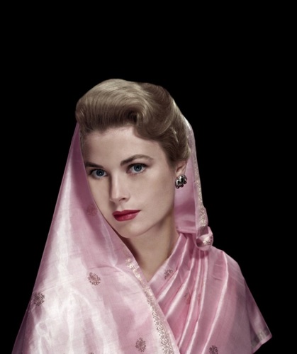 Actress Grace Kelly, later Princess of Monaco, with pink scarf. Actress Grace Kelly, later Princess of Monaco, with pink scarf.