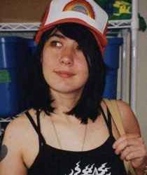 Kathleen Hanna with rainbow cap.