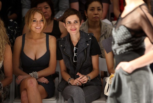 Lindsay Lohan and Samantha Ronson, watching the dress and the model, respectively.