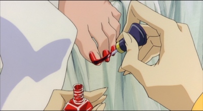 Touga paints Shiori's nails.