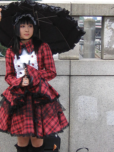 A Gothic Lolita in tartan. Photo by Jae Young Kim. CC Attribution License.