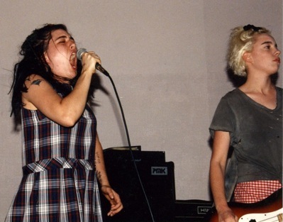 Two members of Bikini Kill