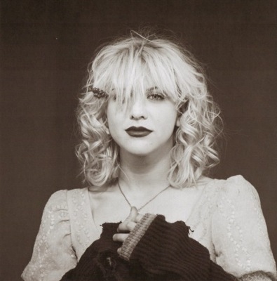Courtney Love in a kinderwhore outfit.