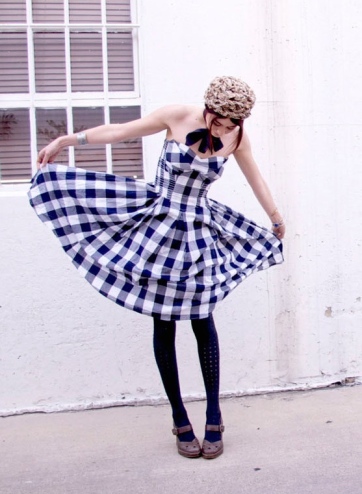 Megan Stewart in checkered dress.