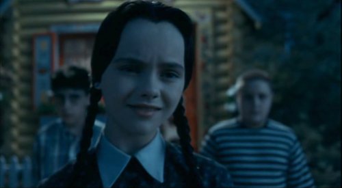 Wednesday's smile is full of woe. Wednesday's smile is full of woe.