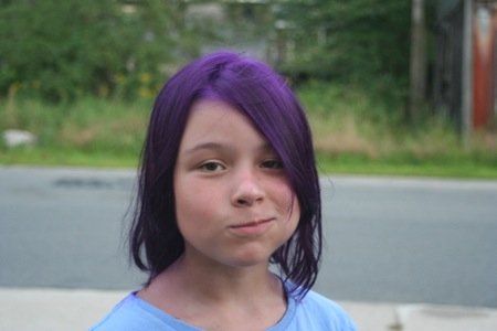 A young girl with purple hair. Photo by Kelly Taylor.